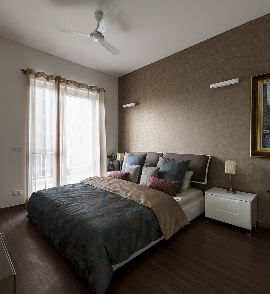 Master bedroom with wooden flooring in the sample apartment (actual image)